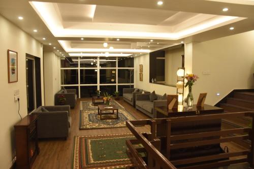 Shared lounge/TV area, Nirvana Retreat in Kurseong Shared lounge/TV area, Nirvana Retreat in Kurseong