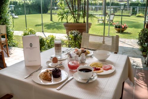 Comida y bebida, Hotel Hermitage in Forte Dei Marmi Comida y bebida, Hotel Hermitage in Forte Dei Marmi