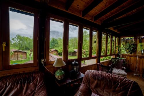 Спільний лаунж/ТБ зона, Hotel rural Picos de Europa in Посада де Вальдерон Спільний лаунж/ТБ зона, Hotel rural Picos de Europa in Посада де Вальдерон