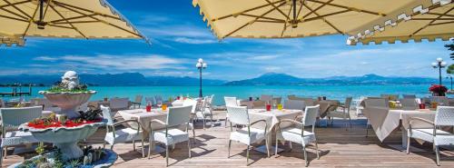 Étterem, Hotel Lugana Parco Al Lago in Lugana di Sirmione Étterem, Hotel Lugana Parco Al Lago in Lugana di Sirmione