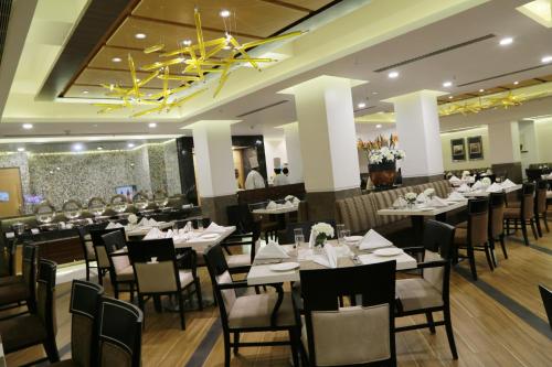 レストラン, フォーチュン パーク ギャラクシー バピ メンバー ITC ホテルズ グループ (Fortune Park Galaxy, Vapi - Member ITC Hotels' Group) in ヴァピ レストラン, フォーチュン パーク ギャラクシー バピ メンバー ITC ホテルズ グループ (Fortune Park Galaxy, Vapi - Member ITC Hotels' Group) in ヴァピ
