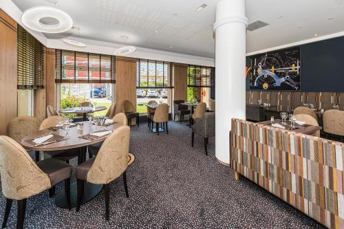 Sala de refeições, Hostellerie Saint Vincent Beauvais Aeroport in Beauvais Sala de refeições, Hostellerie Saint Vincent Beauvais Aeroport in Beauvais