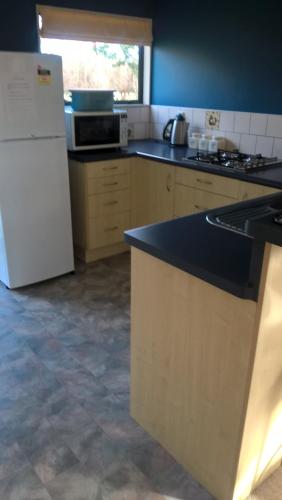 ห้องครัว, Minffordd Cottage in ฟ็อกซ์ตัน บีช ห้องครัว, Minffordd Cottage in ฟ็อกซ์ตัน บีช