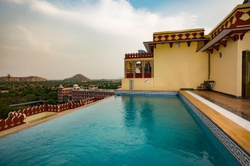 Swimming pool, Umaid Haveli-A Heritage Style Hotel & Resort in Jaipur Swimming pool, Umaid Haveli-A Heritage Style Hotel & Resort in Jaipur