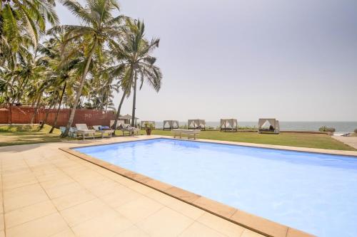 Beach-facing room for three, ideal for a lavish holiday, by GuestHouser
Beach-facing room for three, ideal for a lavish holiday, by GuestHouser