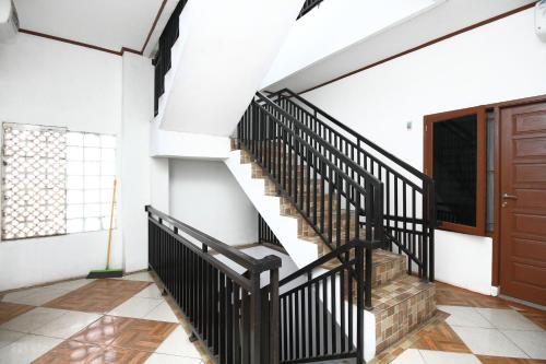 This photo about Airy Eco Palmerah Barat Sembilan 75 Jakarta shared on HyHotel.com