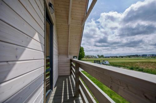 Erkély/terasz, Sarbinowo Prestige - Ekskluzywne domki nad morzem in Sarbinowo Erkély/terasz, Sarbinowo Prestige - Ekskluzywne domki nad morzem in Sarbinowo