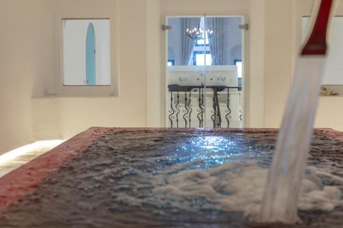 This photo about Opera Mansion Santorini shared on HyHotel.com