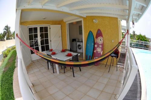 Balcony/terrace, Petit havre de paix - Piscine et plage a pied in Mare Gaillard Balcony/terrace, Petit havre de paix - Piscine et plage a pied in Mare Gaillard