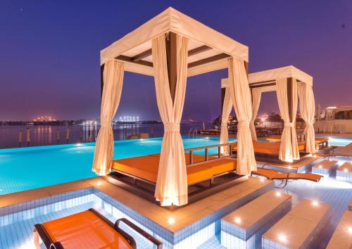 Swimming pool, Royal Central Hotel & Resort in Palm Jumeirah Swimming pool, Royal Central Hotel & Resort in Palm Jumeirah