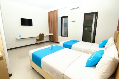 This photo about Airy Citraland International Surabaya shared on HyHotel.com