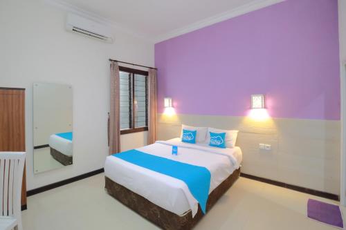 This photo about Airy Denpasar Selatan Gelogor Carik Bali shared on HyHotel.com