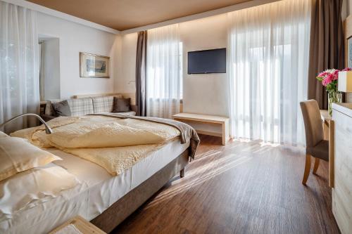 Hotel Menardi in Cortina d'Ampezzo City Center Hotel Menardi in Cortina d'Ampezzo City Center