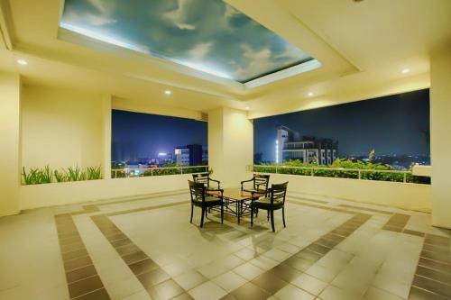Balcony/terrace, Grand Hotel Preanger near Caesars Palace Night Club & Karaoke Balcony/terrace, Grand Hotel Preanger near Caesars Palace Night Club & Karaoke