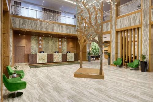 Лоби, Wyndham Garden Astana in Nur-Sultan Лоби, Wyndham Garden Astana in Nur-Sultan