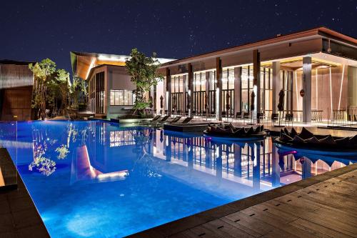 Swimming pool, dusitD2 Khao Yai in Khao Yai Swimming pool, dusitD2 Khao Yai in Khao Yai
