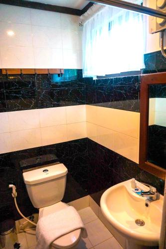 Bathroom, Veranda Suites and Restaurant in Ilocos Norte Bathroom, Veranda Suites and Restaurant in Ilocos Norte