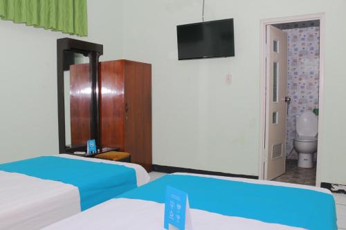 This photo about Airy Mergangsan Prawirotaman Dua 71 Yogyakarta shared on HyHotel.com