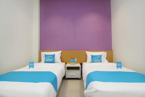 This photo about Airy Medan Kota MT Haryono Surabaya 2 shared on HyHotel.com