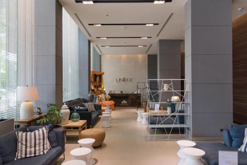 Shared lounge/TV area, Unixx Pattaya by Alvin in Pattaya Shared lounge/TV area, Unixx Pattaya by Alvin in Pattaya