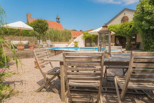 This photo about De Heerlijkheid van Krombeke 'Casa Sophia' shared on HyHotel.com