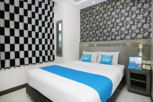 This photo about Airy Pontianak Selatan WR Supratman 33 shared on HyHotel.com