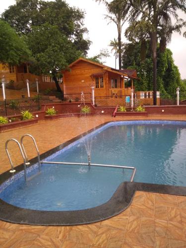 Swimming pool, Cozywoods Hill Resort in Old Goa Swimming pool, Cozywoods Hill Resort in Old Goa