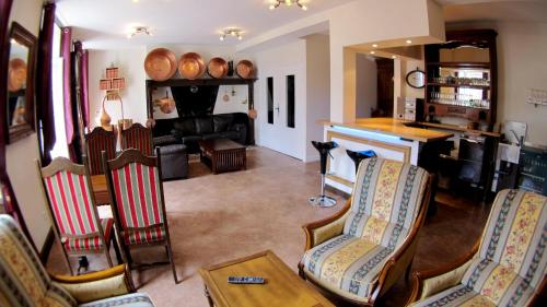 Közös társalgó / TV, Hotel du Lion d'Or in Rocamadour Közös társalgó / TV, Hotel du Lion d'Or in Rocamadour