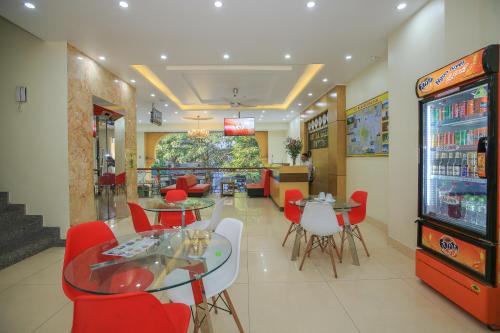 Zona de TV/saló-bar comuns, Cat Ba Green Hotel in Illa de Cat Ba Zona de TV/saló-bar comuns, Cat Ba Green Hotel in Illa de Cat Ba