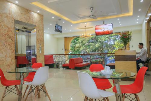 Zona de TV/saló-bar comuns, Cat Ba Green Hotel in Illa de Cat Ba Zona de TV/saló-bar comuns, Cat Ba Green Hotel in Illa de Cat Ba