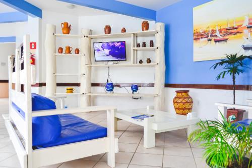صالة مشتركة/ منطقة التلفزيون, Hotel Porto das Ancoras in بورتو سيجورو صالة مشتركة/ منطقة التلفزيون, Hotel Porto das Ancoras in بورتو سيجورو