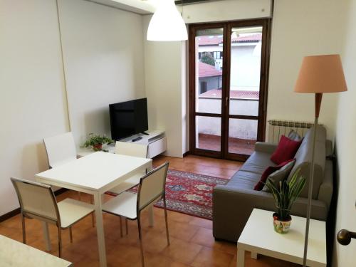 Lounge/area TV in comune, Casa Carducci in Turate Lounge/area TV in comune, Casa Carducci in Turate