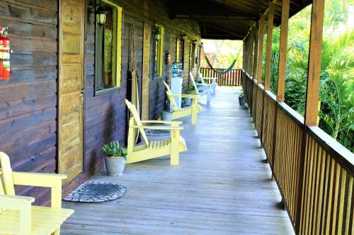 Terraza/balcón, The Log Cab-Inn in San Ignacio Terraza/balcón, The Log Cab-Inn in San Ignacio
