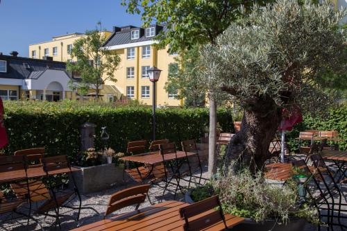 Ресторан, Hotel Alarun in Unterschleissheim Ресторан, Hotel Alarun in Unterschleissheim