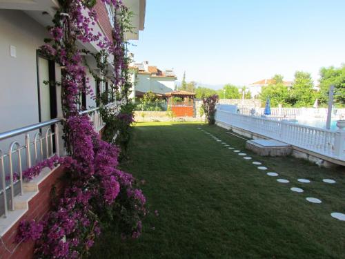 Garden, Dalyan Palmiye Resort Hotel in Dalyan Garden, Dalyan Palmiye Resort Hotel in Dalyan
