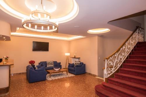 Zona de TV/saló-bar comuns, Evenia Oros in Encamp Zona de TV/saló-bar comuns, Evenia Oros in Encamp