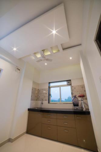 Kitchen, Acons Palm Beach in Alibaug Kitchen, Acons Palm Beach in Alibaug