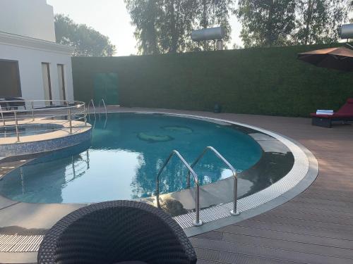 Piscină, Country Inn & Suites by Radisson Zirakpur in Chandigarh Piscină, Country Inn & Suites by Radisson Zirakpur in Chandigarh