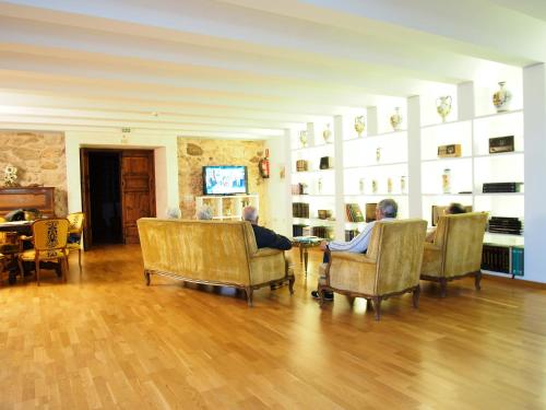 gedeelde lounge/tv-ruimte, Monasterio El Olivar in Andorra gedeelde lounge/tv-ruimte, Monasterio El Olivar in Andorra