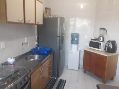 廚房, Apartamento amplo, arejado e com otima localizacao in 伊塔科魯比 廚房, Apartamento amplo, arejado e com otima localizacao in 伊塔科魯比