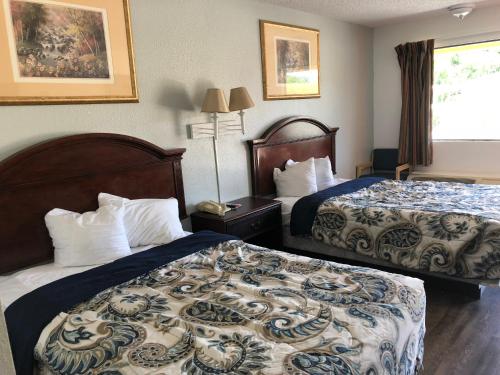 在meiguo.com看到的Executive Garden Titusville Hotel的介绍图片