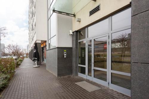 Warsaw Promenada Family Apartment by Noclegi Renters