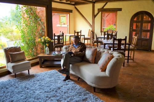 ห้องส่วนกลางสำหรับนั่งเล่น/ดูทีวี, Ilatoa Lodge in ตุมบาโก ห้องส่วนกลางสำหรับนั่งเล่น/ดูทีวี, Ilatoa Lodge in ตุมบาโก