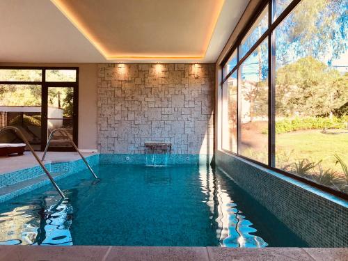 Úszómedence, Paradiso Hotel in Villa de Merlo Úszómedence, Paradiso Hotel in Villa de Merlo