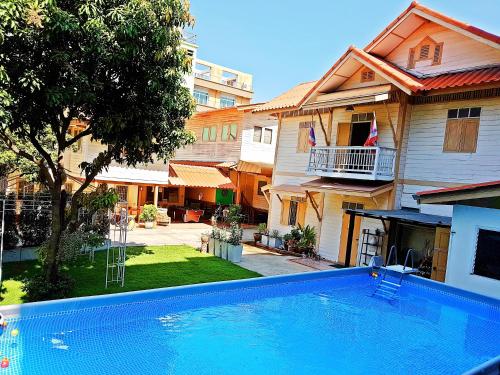 This photo about Private Villa - Pool & Garden - Family Friendly - Bangkok Center shared on HyHotel.com