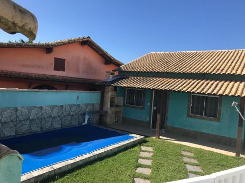 Casa com piscina, wifi e churrasqueira em unamar. in Unamar Casa com piscina, wifi e churrasqueira em unamar. in Unamar