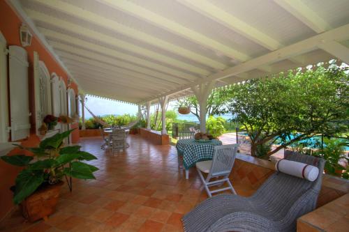 Terraza/balcón, Villa avec piscine et vue mer (MQRO08) in Le Robert Terraza/balcón, Villa avec piscine et vue mer (MQRO08) in Le Robert