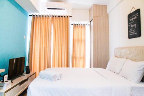 Simply Studio Room Akasa Pure Living BSD Apartment By Travelio