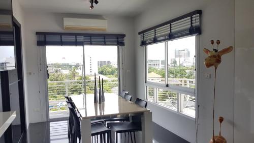 This photo about Flame Tree Residence 2-Bedroom Apartment shared on HyHotel.com