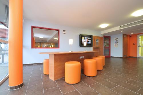 Közös társalgó / TV, Hotel Rhynern Nord in Hamm Közös társalgó / TV, Hotel Rhynern Nord in Hamm